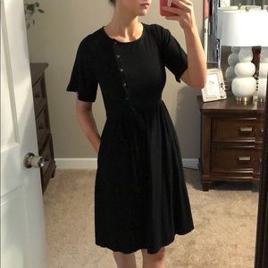 Black cotton dress with button detail